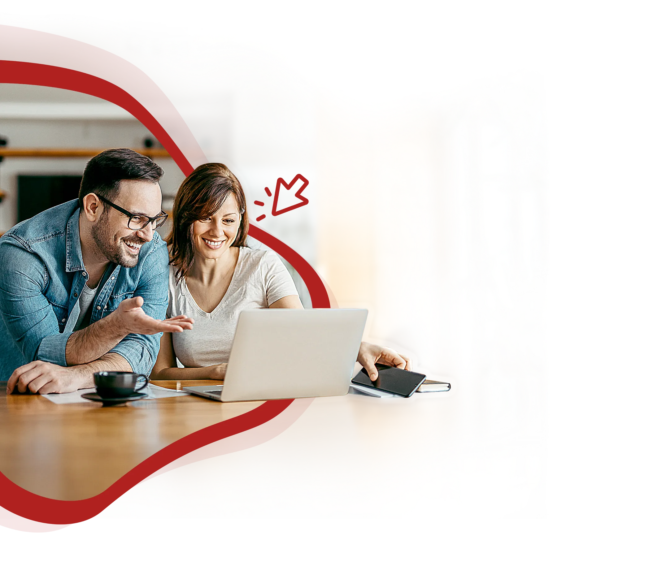 A man and women looking into the laptop